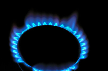 gas burner with burning gas. dark background