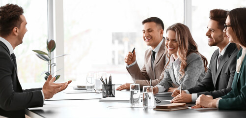 Human resources commission interviewing man in office