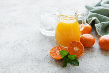 Jug of fresh orange tangerine juice