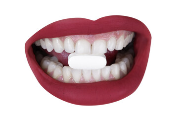 Cutout of womans lips with pill