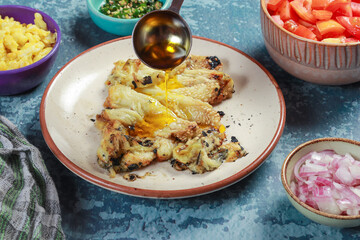 preparation of making begun varta or barbeque of brinjal