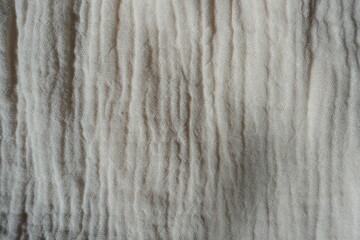 Background - texture of simple white cotton muslin fabric
