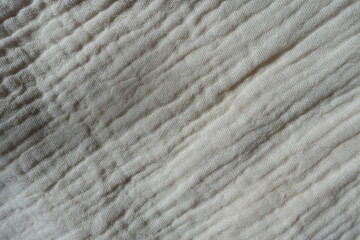 Swatch of simple white cotton muslin fabric