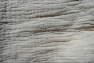 View of simple white cotton muslin fabric from above