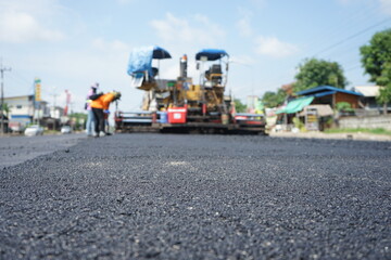 Naklejka premium The image is blurred in the construction of asphalt road.