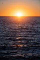 Calm ocean water. Seascape on sunrise over sea. Nature landscape. Beautiful cloudscape over the sea, sunrise shot.