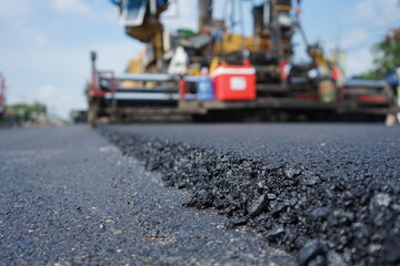 Blurred image of traffic paving work on the highway