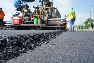 Blurred image of traffic paving work on the highway