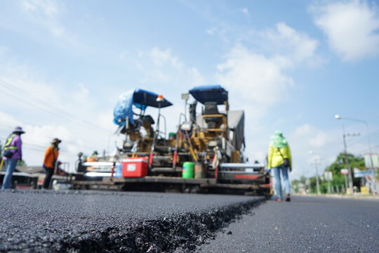 Blurred image of traffic paving work on the highway