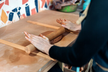 Kneading Clay in Pottery Class