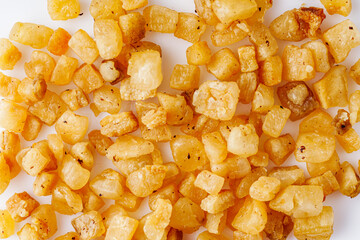 fried lard cracklings on a white background