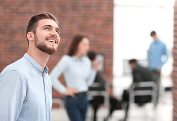 Fototapeta premium Portrait of young businessman in office.