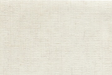The texture of natural linen fabric is white with a milky tint. Coarse linen fabric, burlap.