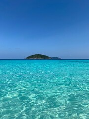 Tropical island in the middle of the see © Ruslan