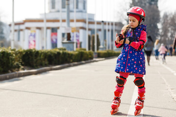 Young happy skater trying exciting outdoor activity.