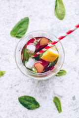Summer refreshing drink with rhubarb, lemon and mint