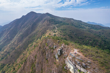 Fototapeta premium Epic view of hiker man on the mountain of Pat Sin Leng, Tai Po