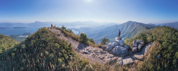 Fototapeta na wymiar Epic view of hiker man on the mountain of Pat Sin Leng, Tai Po