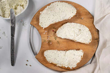 Sandwiches with vegetable ricotta and green fresh veggies
