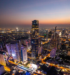 Fototapeta premium Aerial view of King Power Mahanakhon tower in Sathorn Silom central business district of Bangkok, Thailand