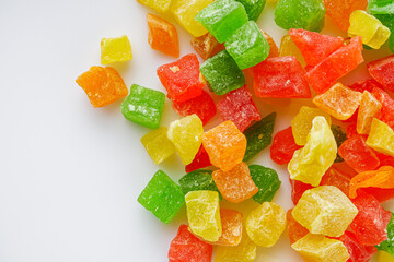 colored candied fruits on a white background