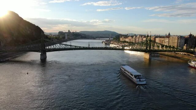 Aerial shot of Danube river cruise at sunset