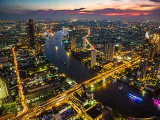 Aerial view of Saphan Taksin district near the Taksin bridge and Chao Phraya river, Bangkok, Thailand