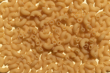 Pasta background. Wallpaper. Pasta close-up. Place for text. Ingredient for cooking.