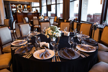 Decorated wedding banquet hall in white and brown tones