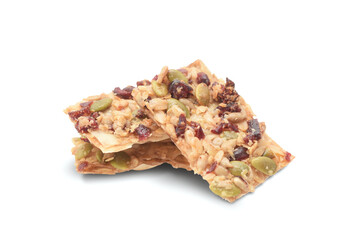 Cookie layered filo dough with cranberries and pumpkin seeds isolated on white. Healthy nutrition or vegan food for future.