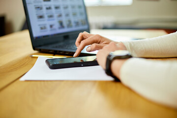 Unrecognizable woman using smartwatch, Freelancer female with smart watch