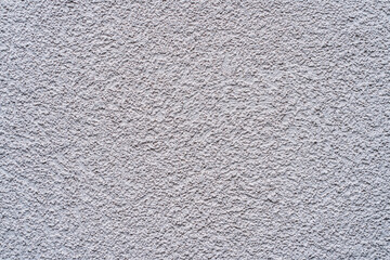 Rough fine-grained gray concrete wall surface for background, uniform natural background of even textured surface