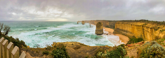 The Twelve Apostles rock formations along the Great Ocean Road, panoramic aerial view - Victoria,...