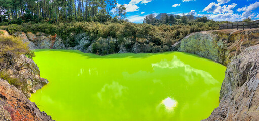 Waiotapu Thermal Track, beautiful colors under a blue sky, panoramic view