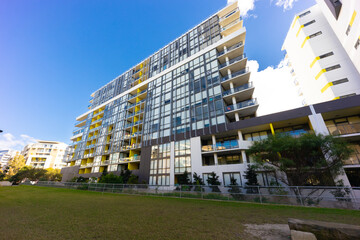 Residential high rise apartment building in inner Sydney suburb NSW Australia. Residential complex in leafy suburbia. Urban living high density suburban city 