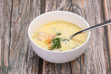 Salmon cream soup served dill