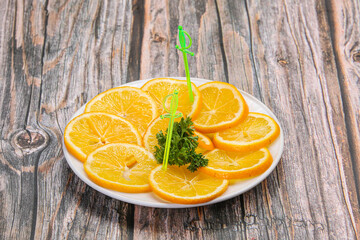 Fototapeta na wymiar Sliced lemon in the plate