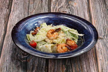 Traditional Caesar salad with prawn