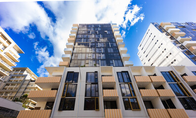 Residential high rise apartment building in inner Sydney suburb NSW Australia. Residential complex in leafy suburbia. Urban living high density suburban city 