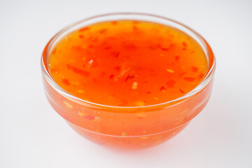 sweet chili sauce on a white acrylic background