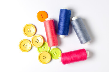 Accessories for sewing on a white background. Closeup.