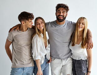 Fototapeta premium Group of best friends hugging and looking at the camera