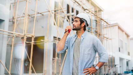 Engineers or leader discussion and pointing to construction site project on workplace. Teamwork, Leadership concept.