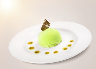 Green Cheesecake on white plate.