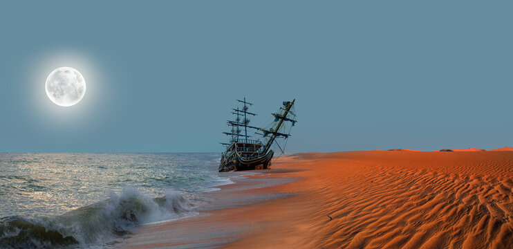 The thrown old ship has sat down on a bank - Namib desert with Atlantic ocean meets near Skeleton coast with full moon at night - Namibia, South Africa "Elements of this image furnished by NASA"