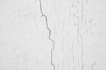 cracked concrete on white wall texture background