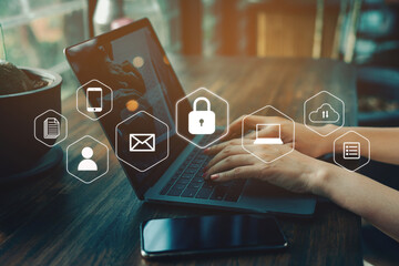 Businessmen protecting personal data on laptop and virtual interfaces, user typing login and...