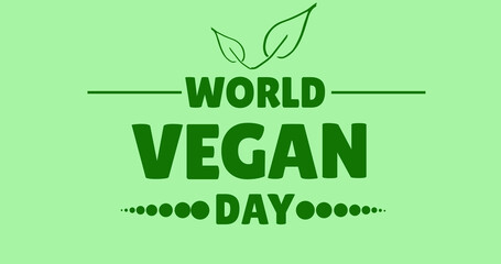 Image of world vegan day text in green, on pale green background