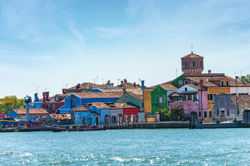 Fototapeta premium Cityscape of Burano island with the multi colored houses view from the sea, Venetian lagoon, Venice, UNESCO world heritage site, Veneto, Italy, Europe. 