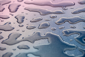 Abstract background of water droplets on the surface. Beautiful background with bokeh, blurred image